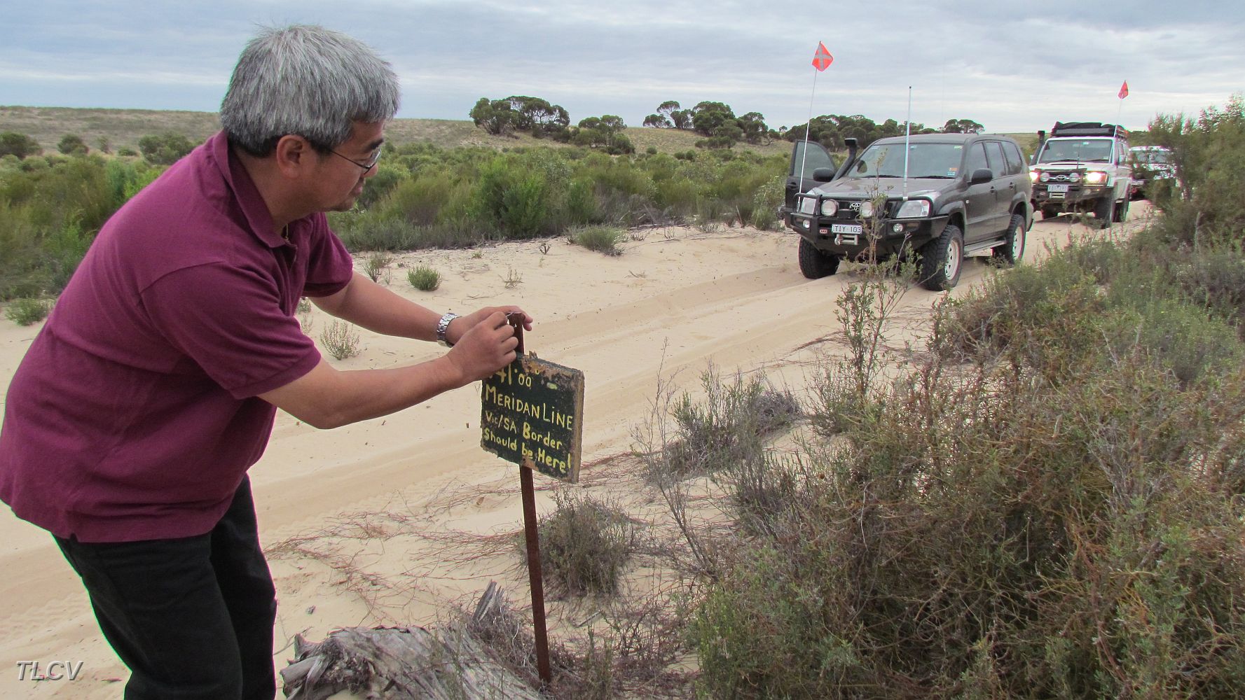 22-Vince re-adjusts the fallen down 'Disputed Country' sign.JPG